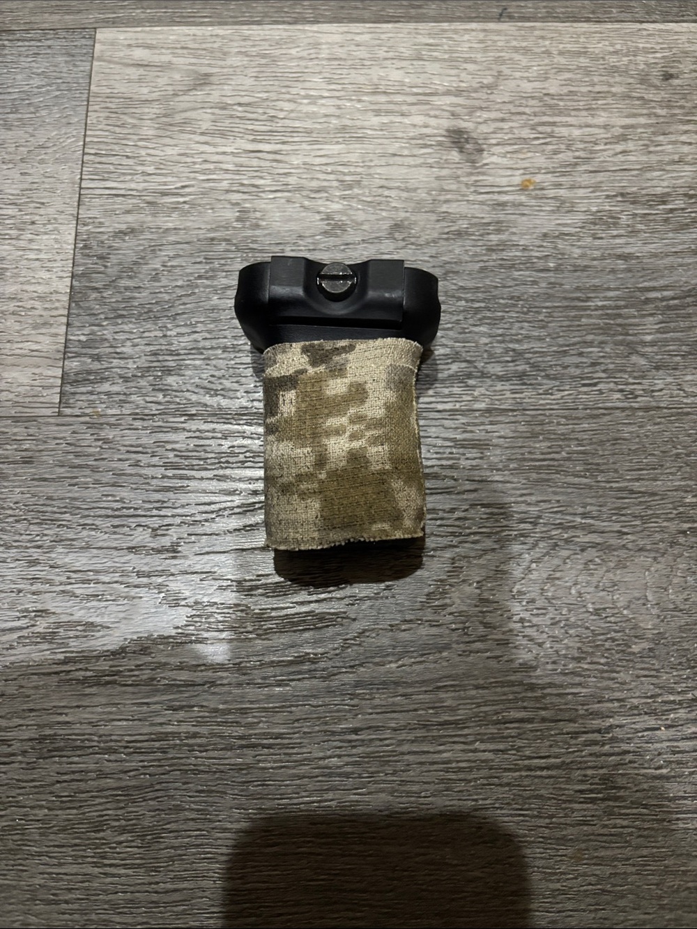 BCM black short vertical foregrip with storage compartment.